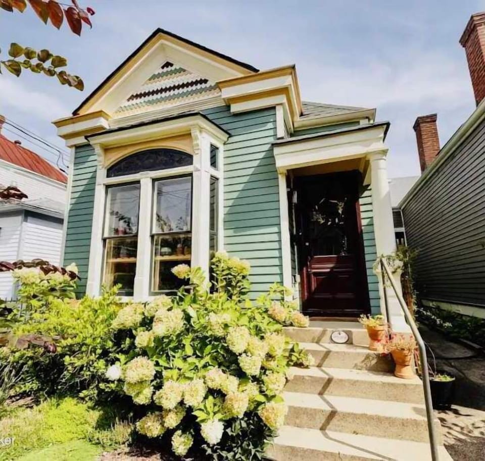  Charming Victorian with lush garden and welcoming front steps