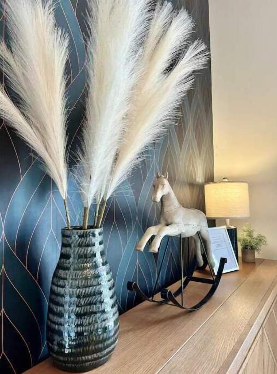  Stylish decor with pampas grass, rocking horse, and warm lighting