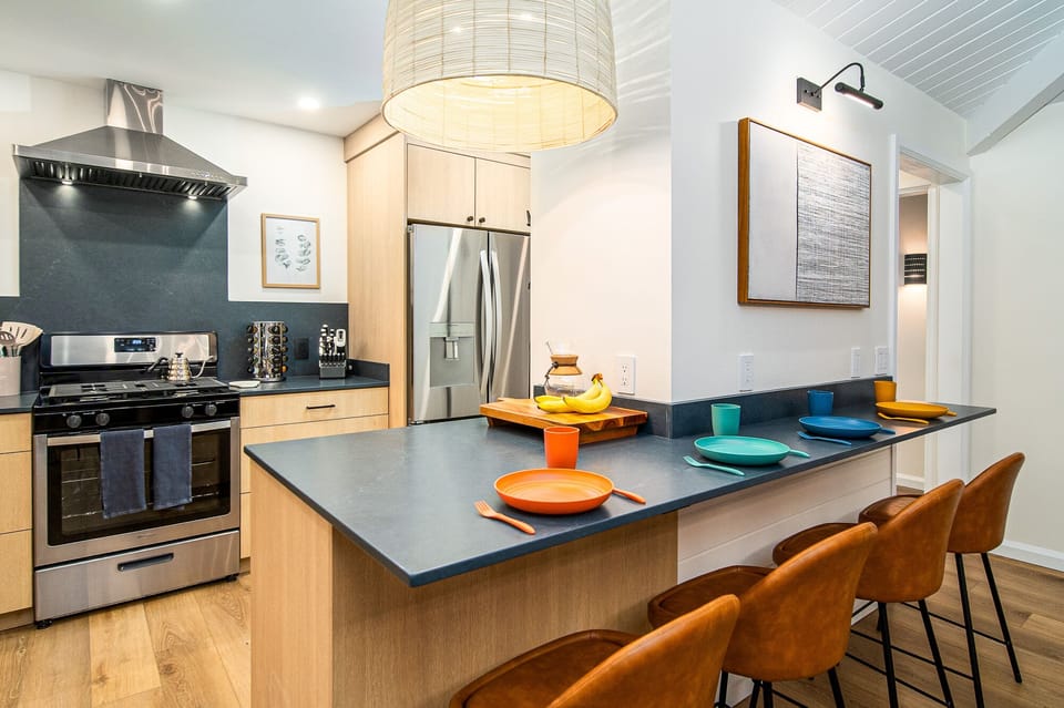 Fully stocked kitchen with family style dining room