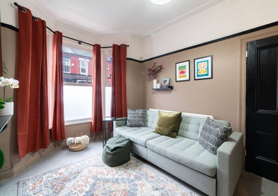 Comfortable Living Space featuring:
- Smart TV with Netflix
- Comfortable seating
- 1 Sofa Bed