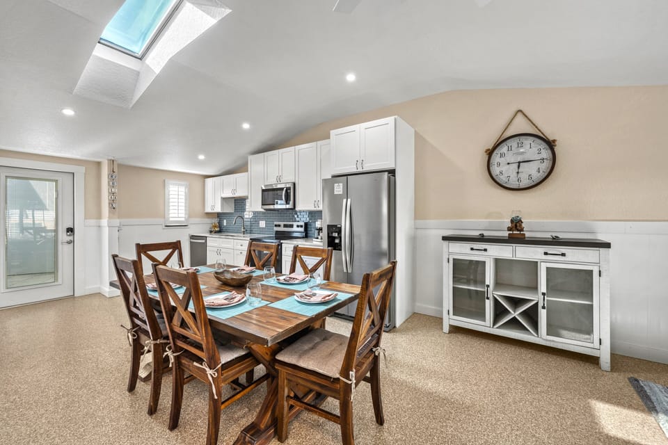 Enjoy meals together in a cozy dining space filled with natural light.
