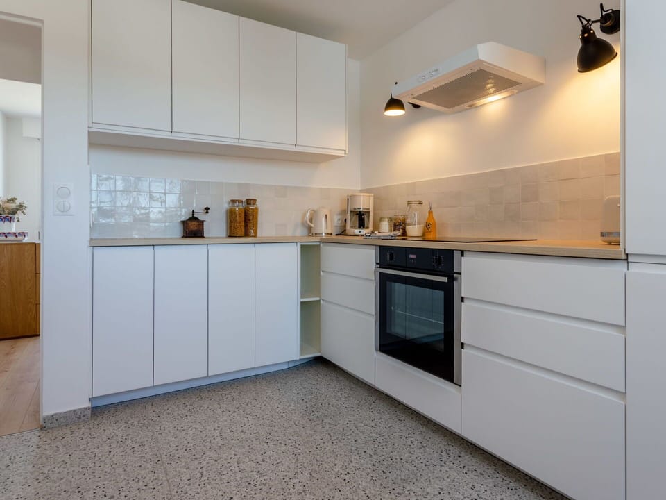 Cabinetry, Countertop, Kitchen Appliance, Kitchen Stove, Kitchen, Home Appliance, Wood, Interior Design, Major Appliance, Floor