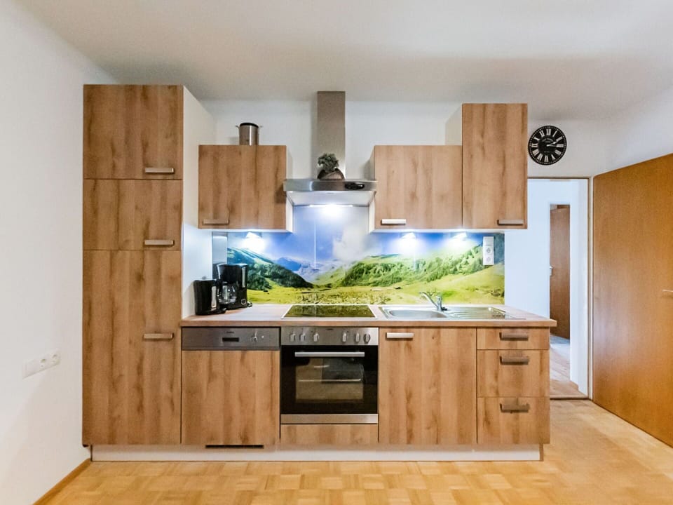 Countertop, Cabinetry, Property, Kitchen, Building, Kitchen Appliance, Home Appliance, Wood, Interior Design, Kitchen Stove