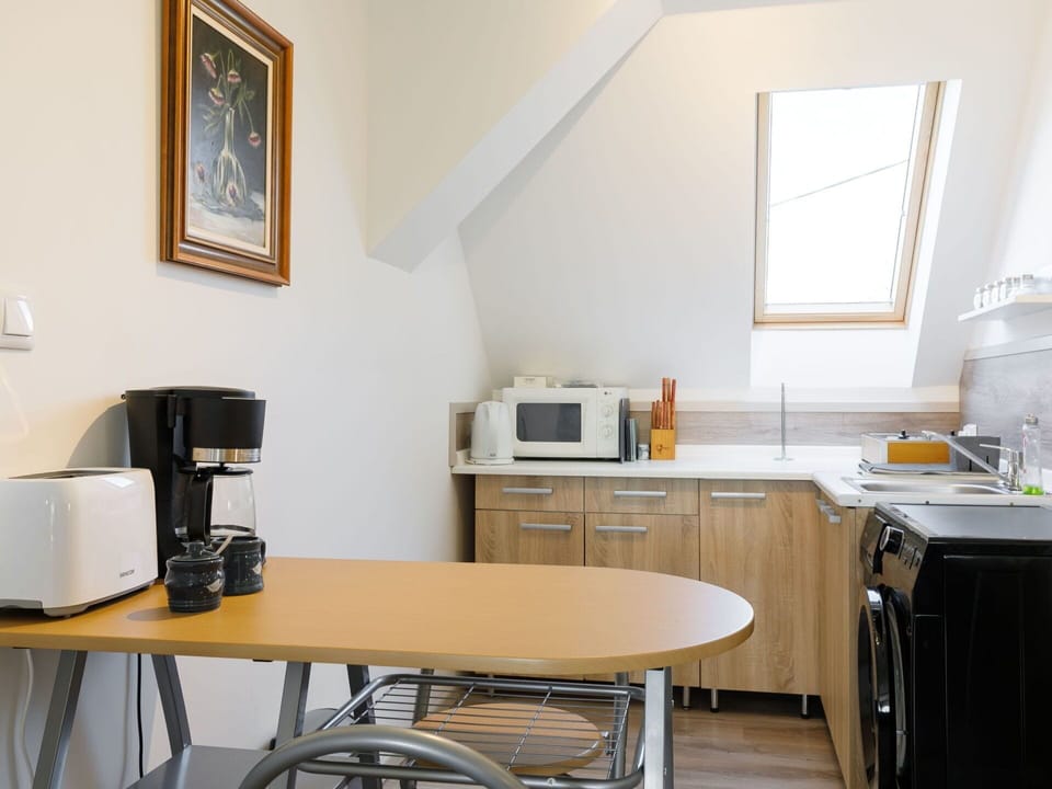Property, Table, Picture Frame, Furniture, Cabinetry, Desk, Window, Interior Design, Floor, Flooring