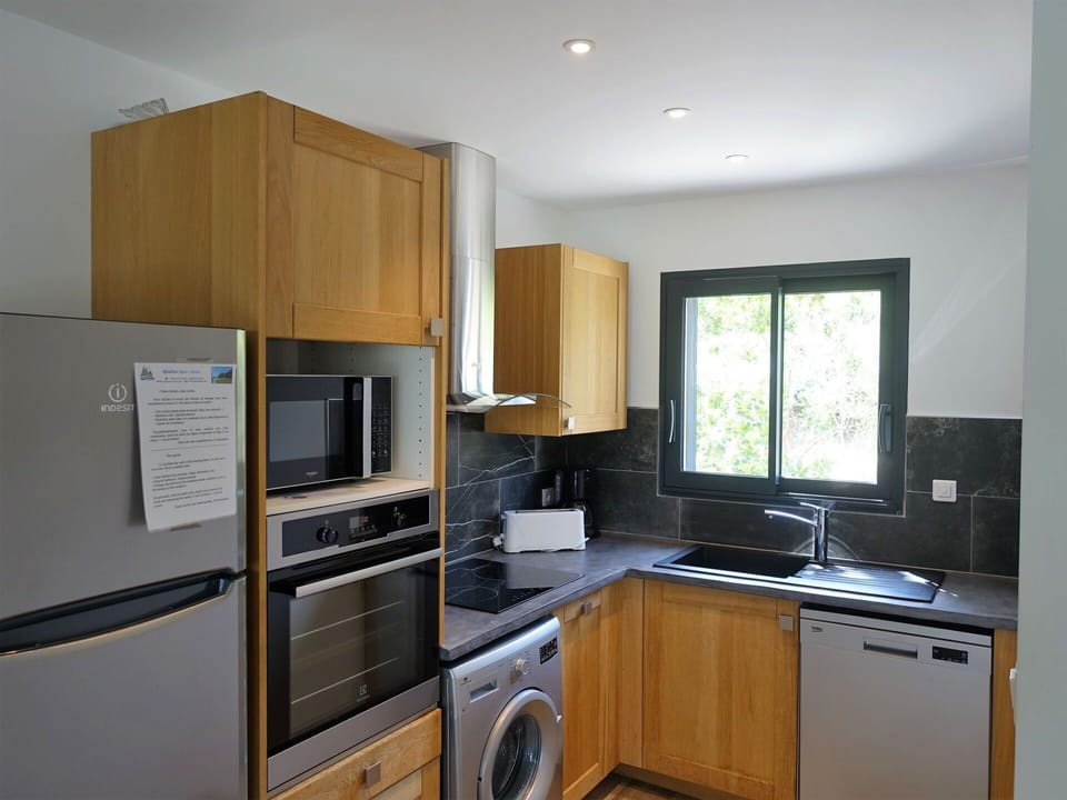 Cabinetry, Countertop, Window, Kitchen Appliance, Kitchen Stove, Home Appliance, Kitchen, Wood, Interior Design, Sink