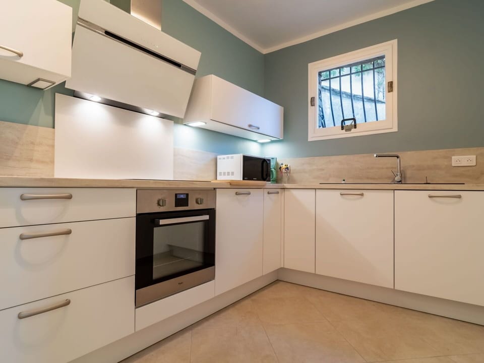 Cabinetry, Countertop, Property, Furniture, Kitchen Sink, Building, Window, Tap, Kitchen Stove, Kitchen