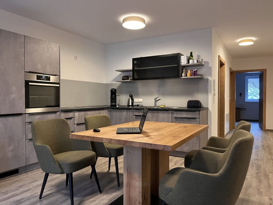 Furniture, Table, Property, Cabinetry, Chair, Countertop, Wood, Lighting, Interior Design, Home Appliance