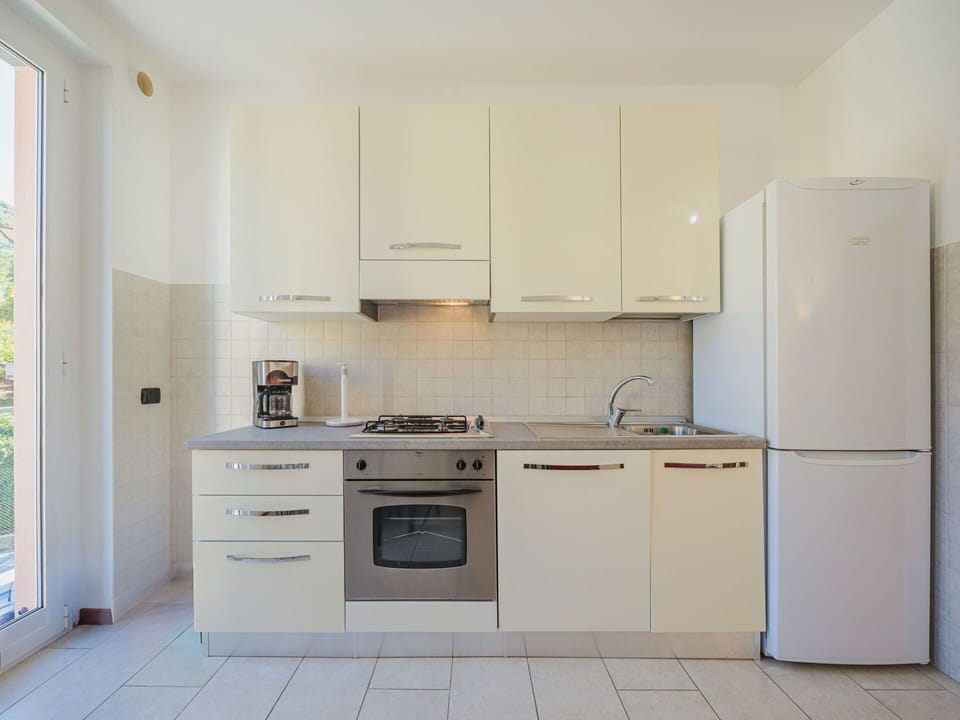 Cabinetry, Building, Countertop, Property, Furniture, Kitchen Stove, Kitchen Appliance, Kitchen, Sink, Kitchen Sink
