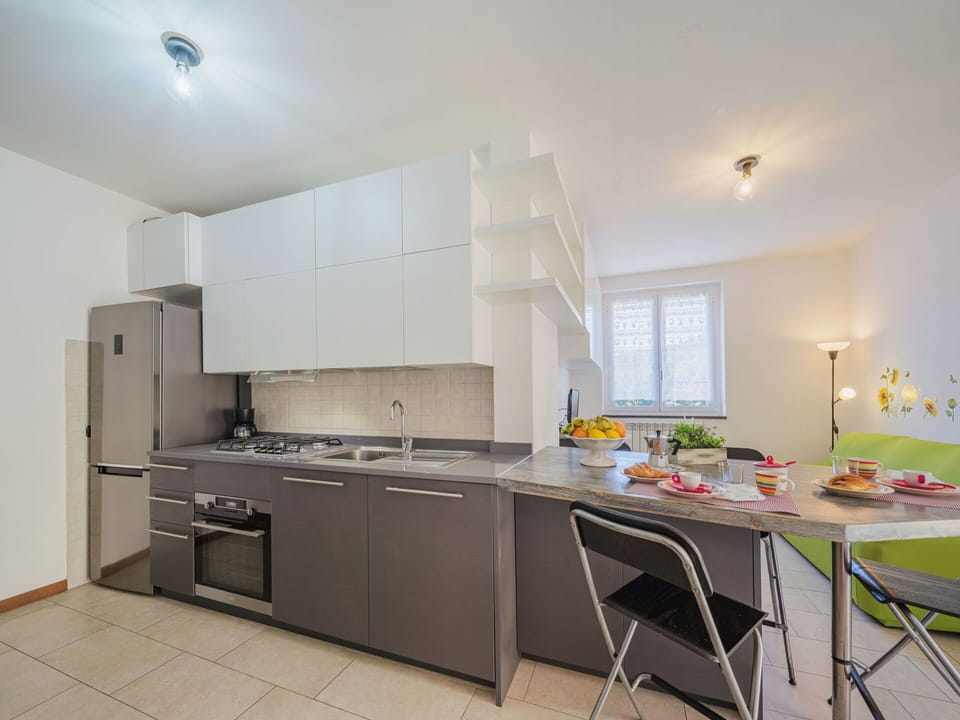 Cabinetry, Furniture, Countertop, Building, Wood, Kitchen Stove, Kitchen, Flooring