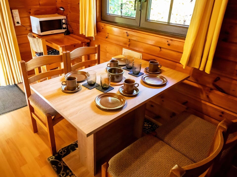 Table, Property, Tableware, Furniture, Cup, Wood, Drinkware, Dishware, Interior Design, Building