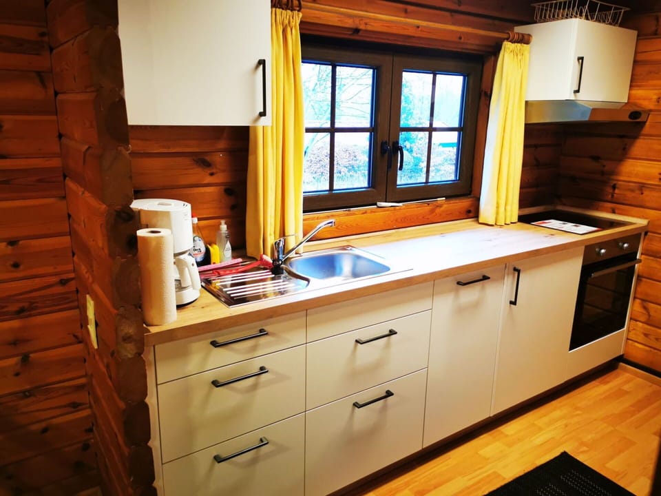 Cabinetry, Property, Countertop, Kitchen Sink, Sink, Window, Tap, Drawer, Wood, Plumbing Fixture