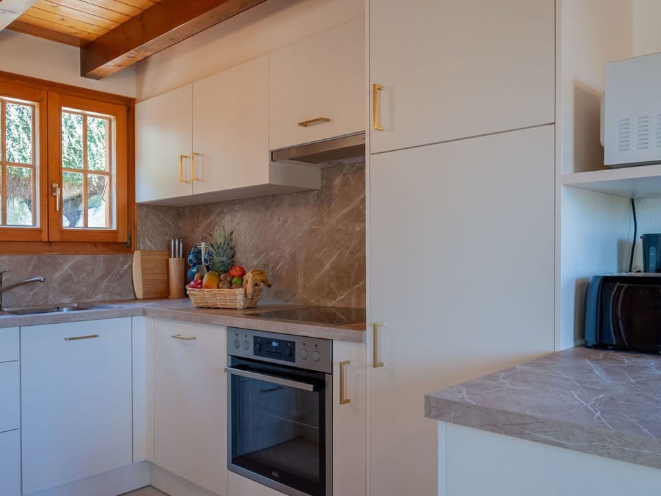 Cabinetry, Countertop, Property, Building, Kitchen Sink, Window, Wood, Kitchen, Kitchen Appliance, Kitchen Stove