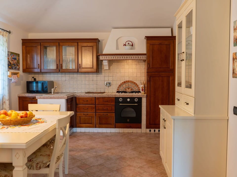 Cabinetry, Countertop, Furniture, Kitchen, Wood, Home Appliance, Kitchen Stove, Interior Design, Architecture, Kitchen Appliance