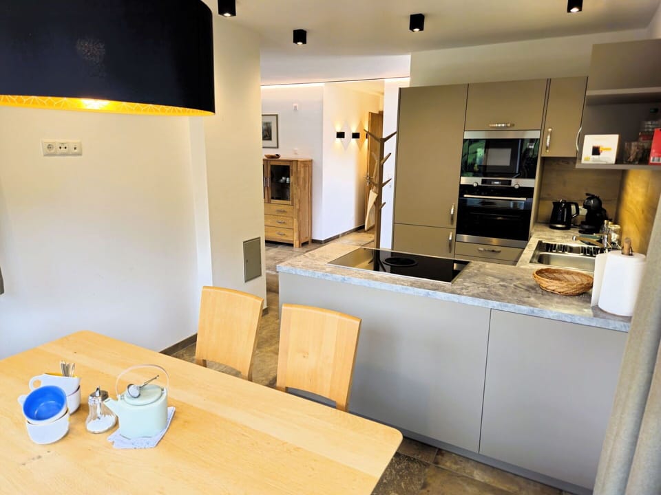 Furniture, Cabinetry, Table, Wood, Interior Design, Chair, Countertop, Home Appliance, Kitchen, Kitchen Appliance