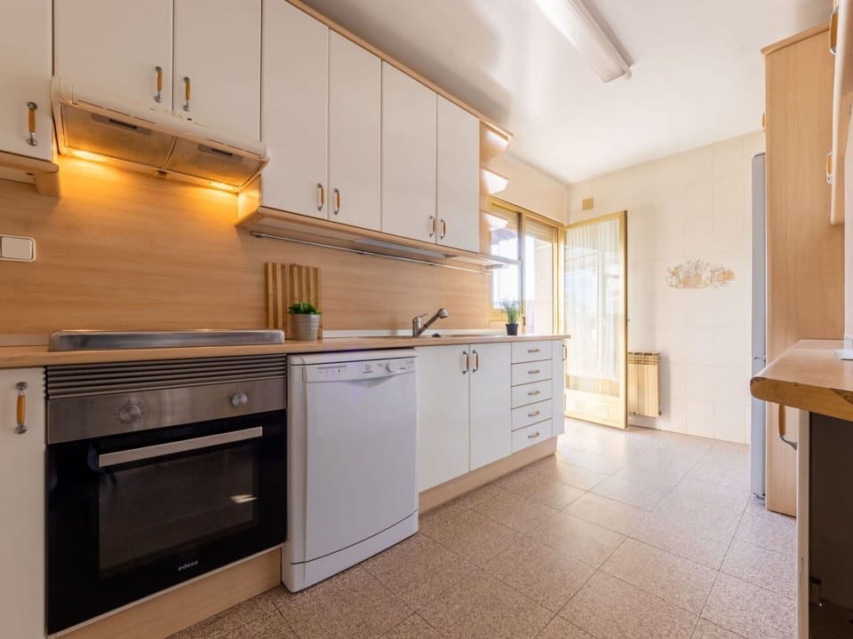 Cabinetry, Furniture, Countertop, Property, Building, Kitchen Stove, Kitchen Appliance, Kitchen, Wood, Interior Design