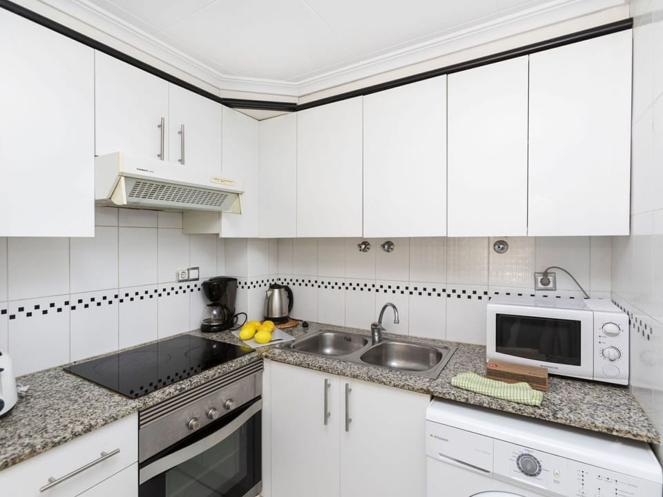 Cabinetry, Countertop, Sink, White, Kitchen Sink, Kitchen Stove, Cooktop, Kitchen, Lighting, Gas Stove