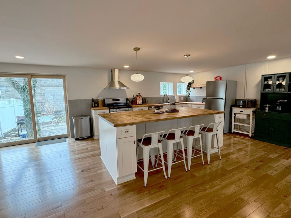 Massive, light-filled kitchen with a walk out patio / courtyard