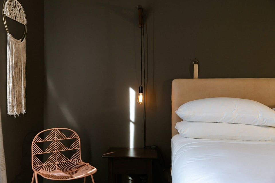 Enjoy thoughtful bedside lighting for late-night reading and calm.
