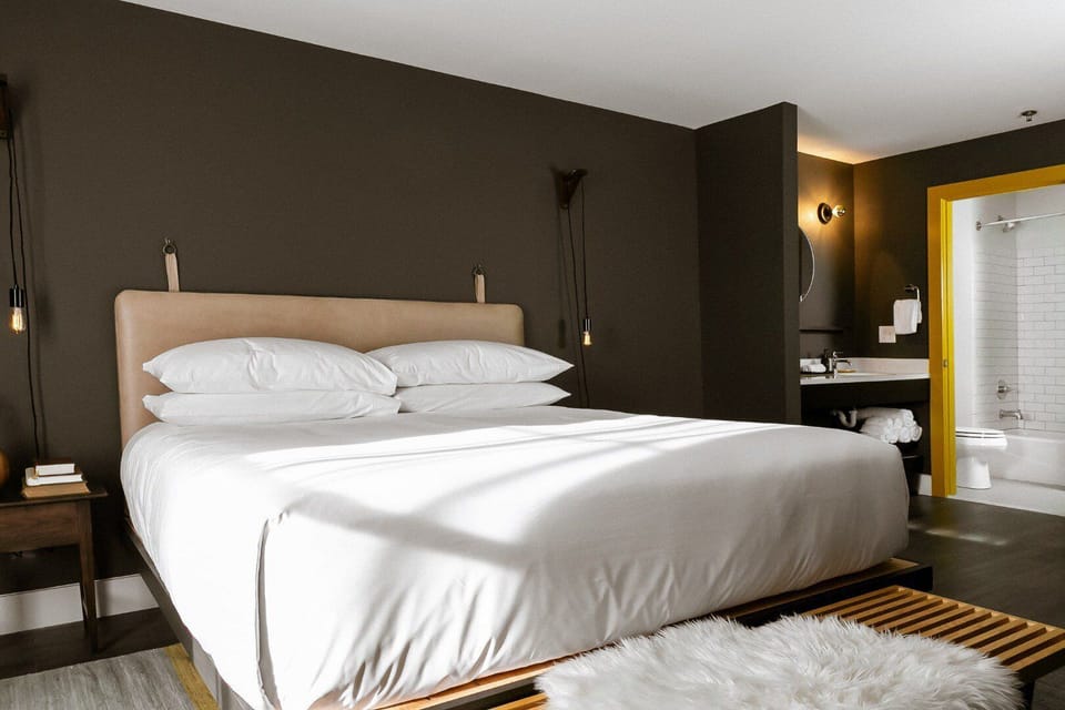 Stretch out on crisp bedding in a bright, peaceful suite.