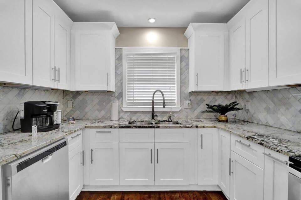 Experience the joy of cooking in a huge kitchen with ample space and modern amenities.