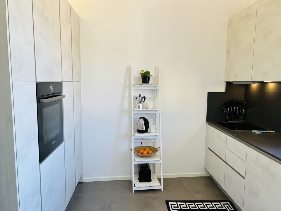 Kitchen with everything you need to make a meal at home, Kettle, coffee maker