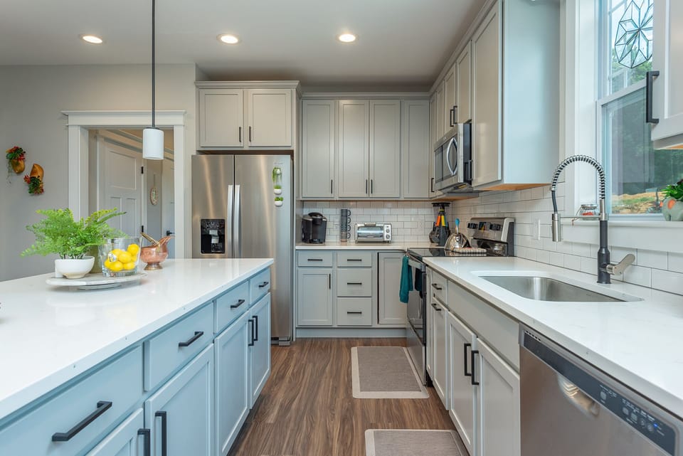 Well-equipped kitchen with island seating for 2, dishwasher, and Keurig coffee maker