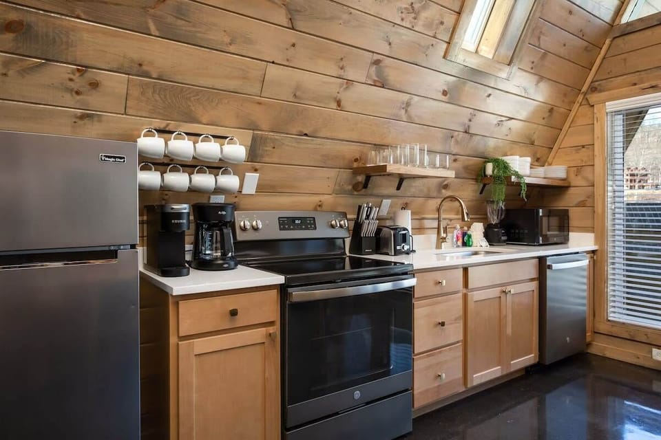 Kitchen Complete With Stainless Steel Appliances And Quartz Countertops!