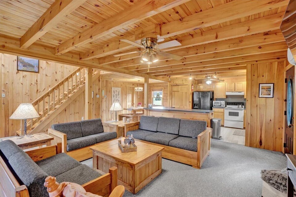 Open concept family room, kitchen, and dining area on main level