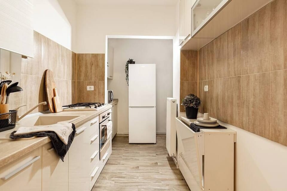 Step into our spacious kitchen, equipped with new appliances and ample workspace, where culinary creativity knows no bounds and every dish becomes a masterpiece.