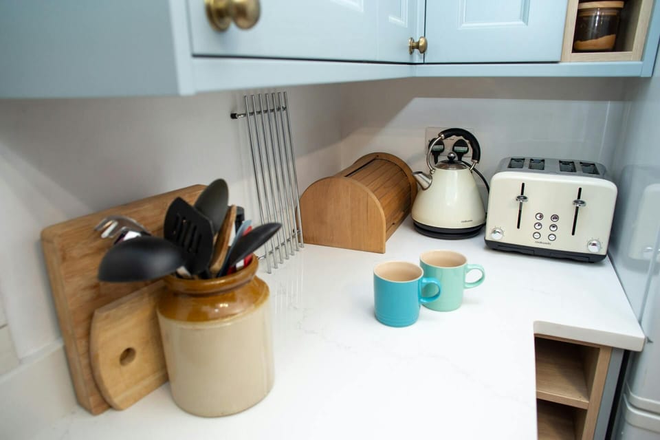 Kitchen  with toaster and kitchen utensils