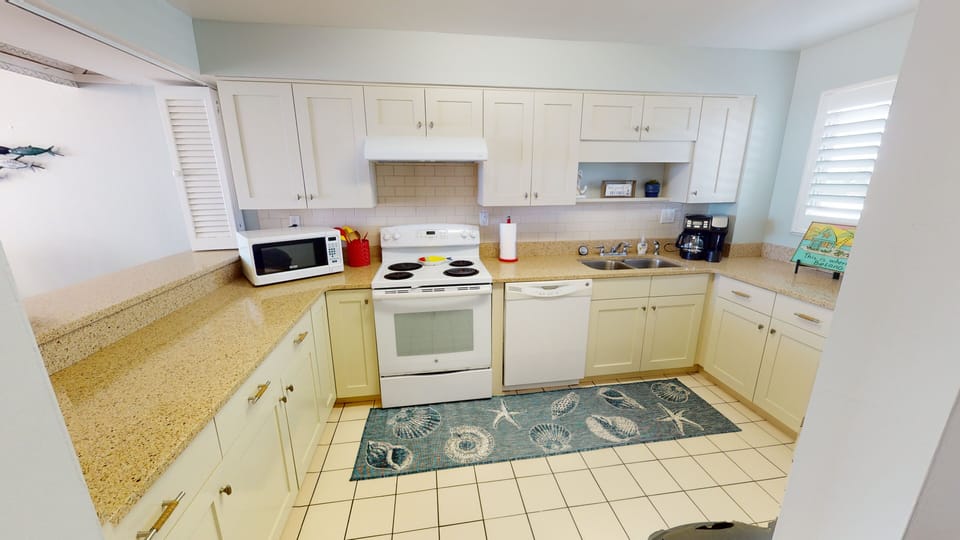 Fully stocked kitchen with all the amenities.