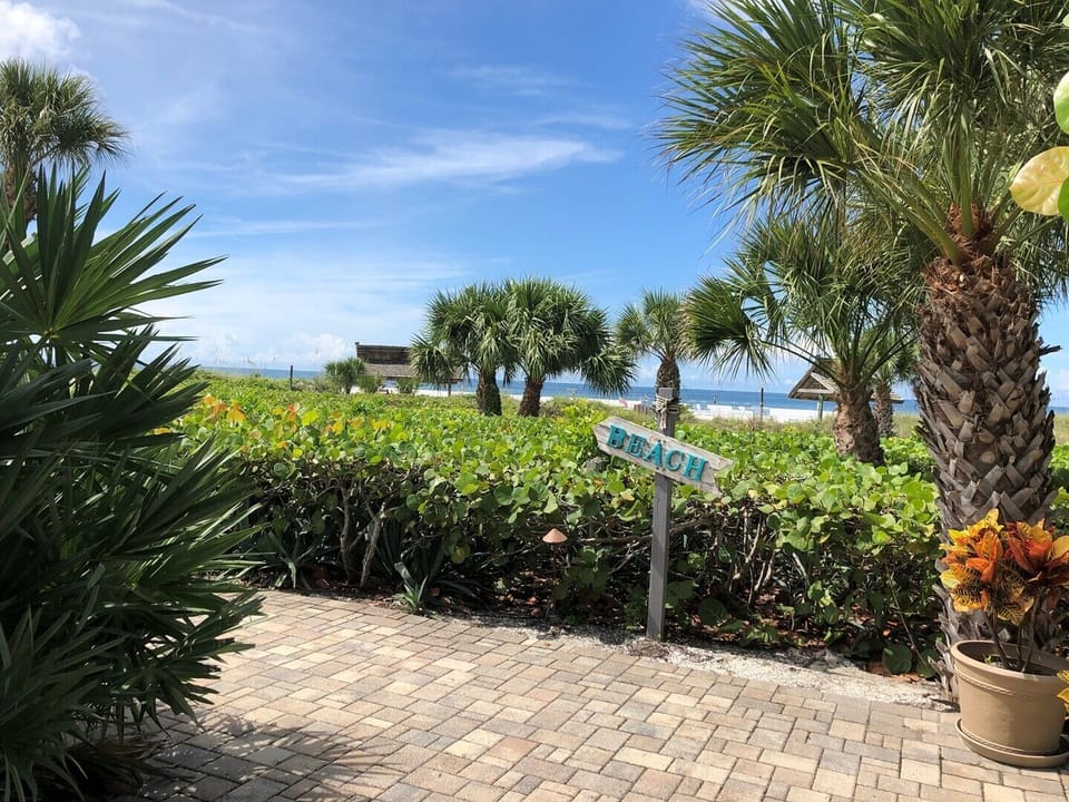 beach sign with sidewalk