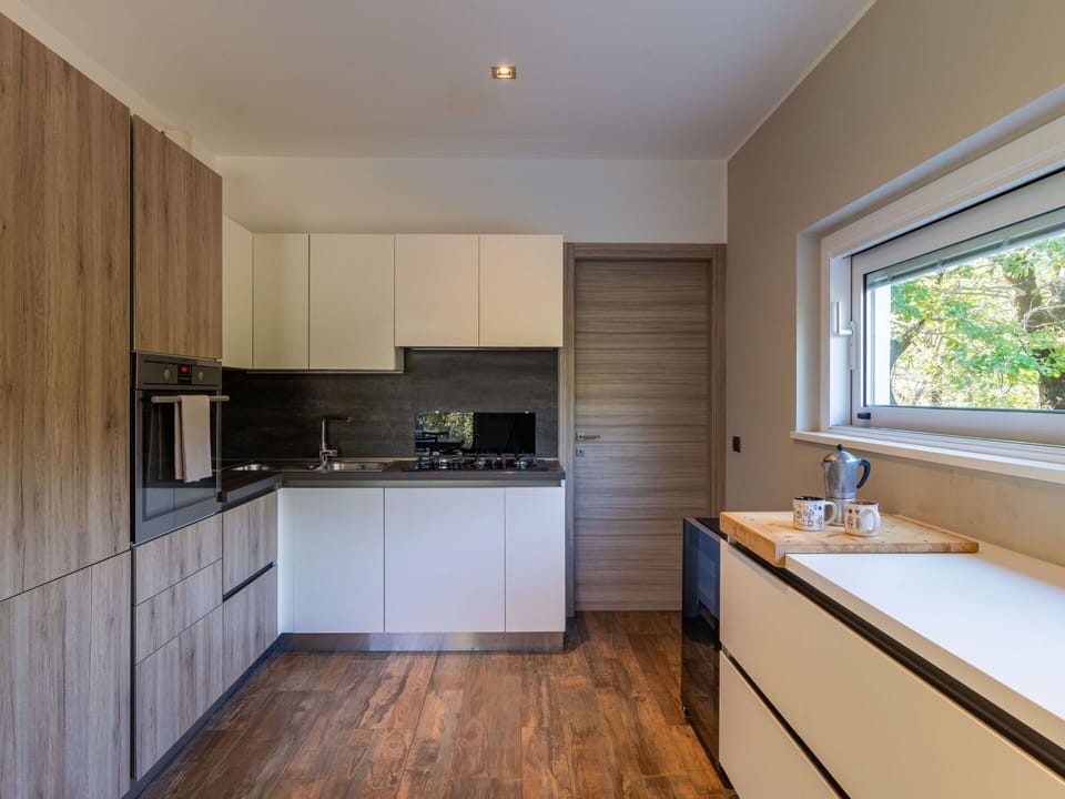 Brown, Cabinetry, Countertop, Property, Kitchen Sink, Sink, Building, Wood, Window, Interior Design