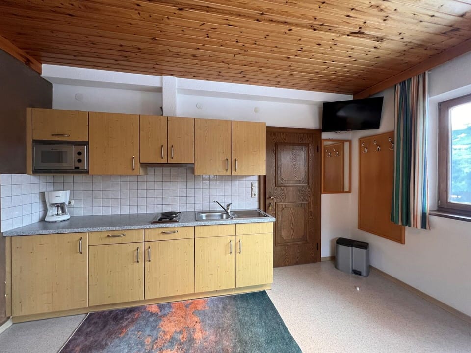 Cabinetry, Property, Sink, Countertop, Window, Building, Wood, Interior Design, Drawer, Tap