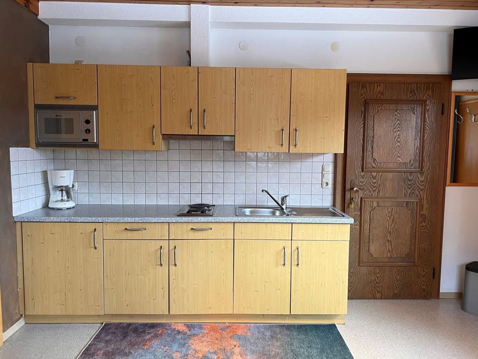 Brown, Cabinetry, Countertop, Tap, Sink, Kitchen Sink, Property, Furniture, Kitchen Stove, Wood