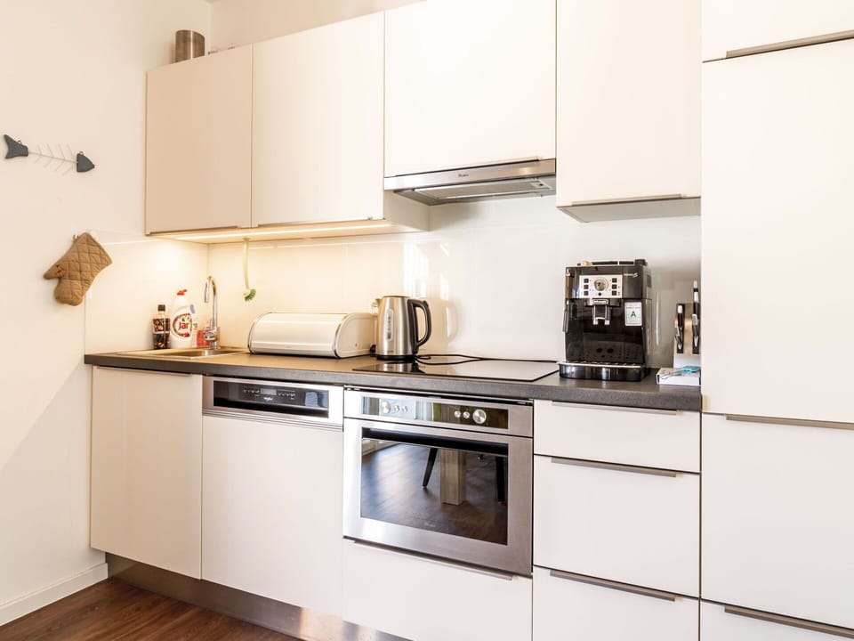 Cabinetry, Property, Countertop, Kitchen Appliance, Kitchen Stove, Kitchen Sink, Sink, Home Appliance, Kitchen, Interior Design