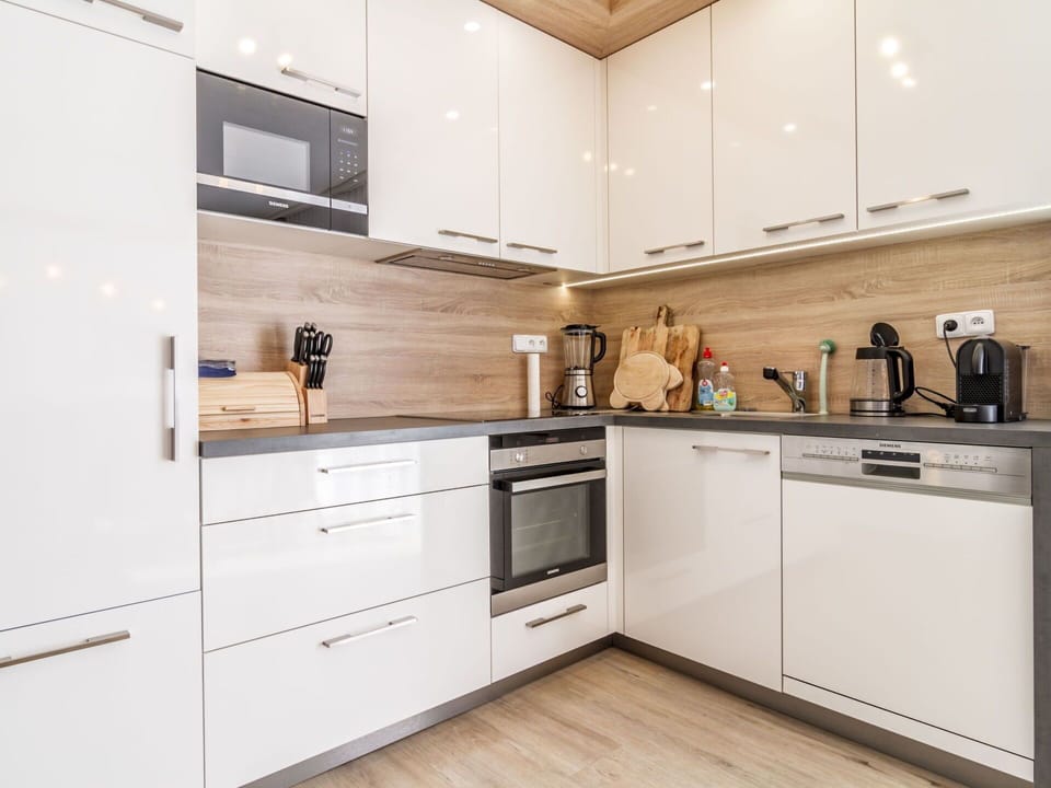 Cabinetry, Property, Countertop, Kitchen Stove, Product, Kitchen Appliance, Kitchen, Wood, Building, Interior Design