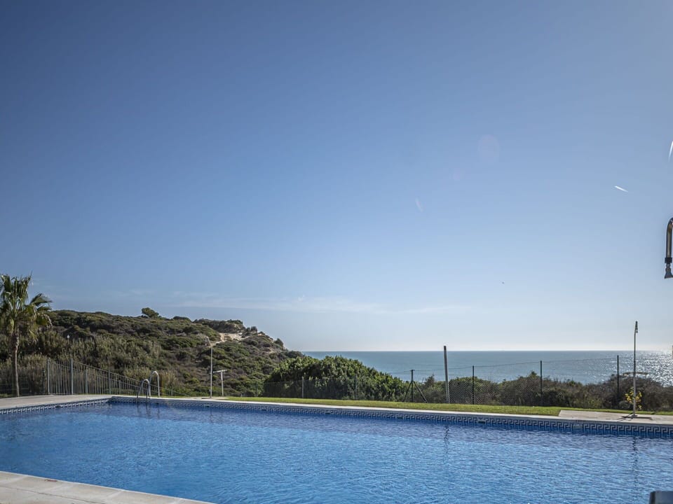 Water, Sky, Swimming Pool, Plant, Blue, Rectangle, Tree, Shade, Outdoor Furniture, Umbrella