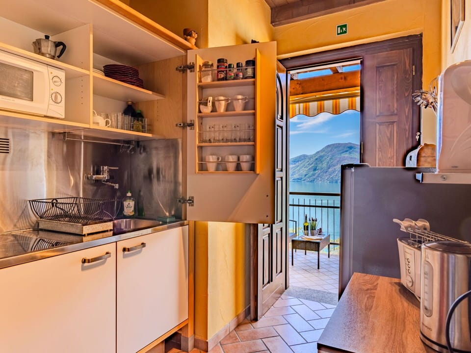 Cabinetry, Property, Countertop, Building, Kitchen Appliance, Wood, Kitchen, Home Appliance, Interior Design, Architecture