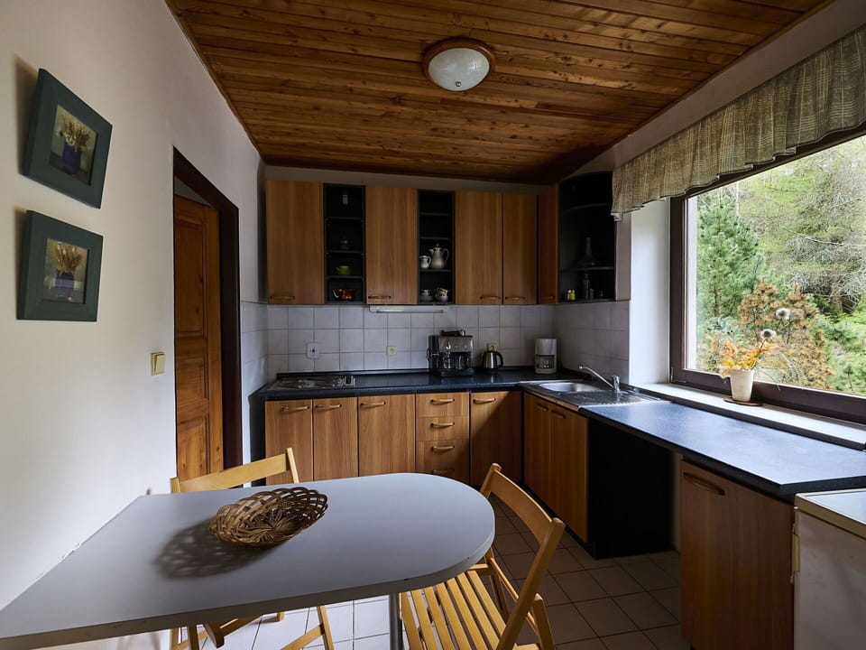 Property, Furniture, Cabinetry, Countertop, Tap, Sink, Window, Table, Picture Frame, Wood