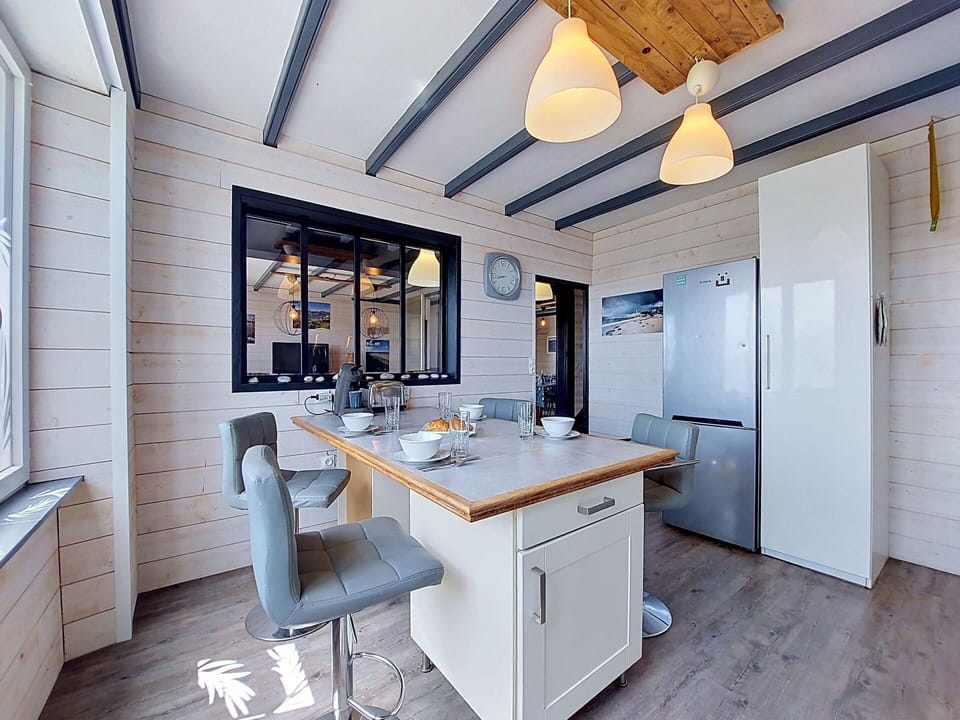 Furniture, Wood, Interior Design, Flooring, Ceiling, Countertop, Kitchen, Cabinetry, Floor, Door