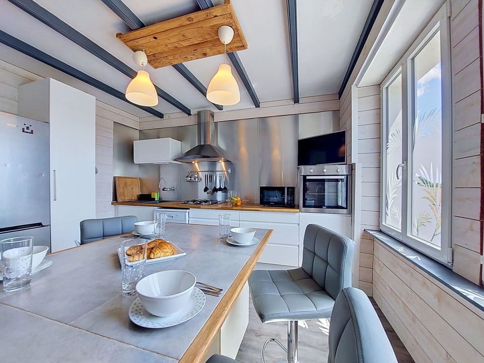 Interior Design, Furniture, Kitchen, Flooring, Wood, Ceiling, Light Fixture, Countertop, Floor, Lighting
