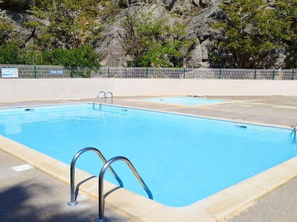 Water, Plant, Swimming Pool, Azure, Tree, Rectangle, Shade, Outdoor Furniture, Grass, Composite Material