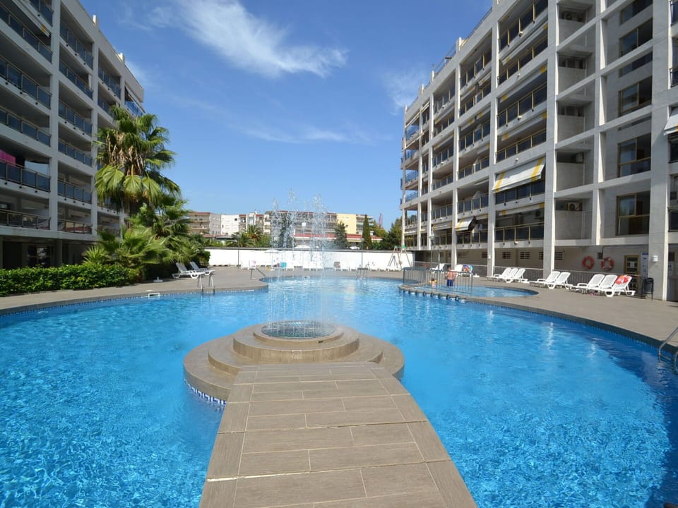 Plant, Sky, Water, Property, Building, Azure, Tree, Swimming Pool, Urban Design, Arecales