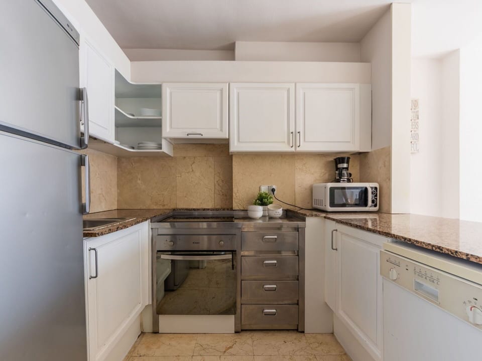 Cabinetry, Countertop, Furniture, Building, Property, Drawer, Kitchen, Kitchen Appliance, Kitchen Stove, Wood
