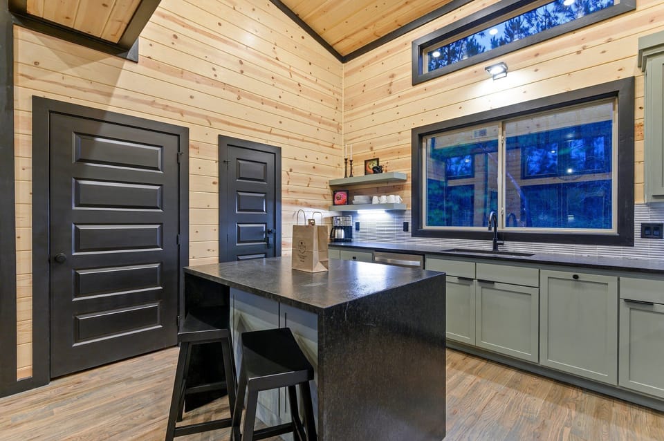 2 additional seats can be found at the kitchen island.