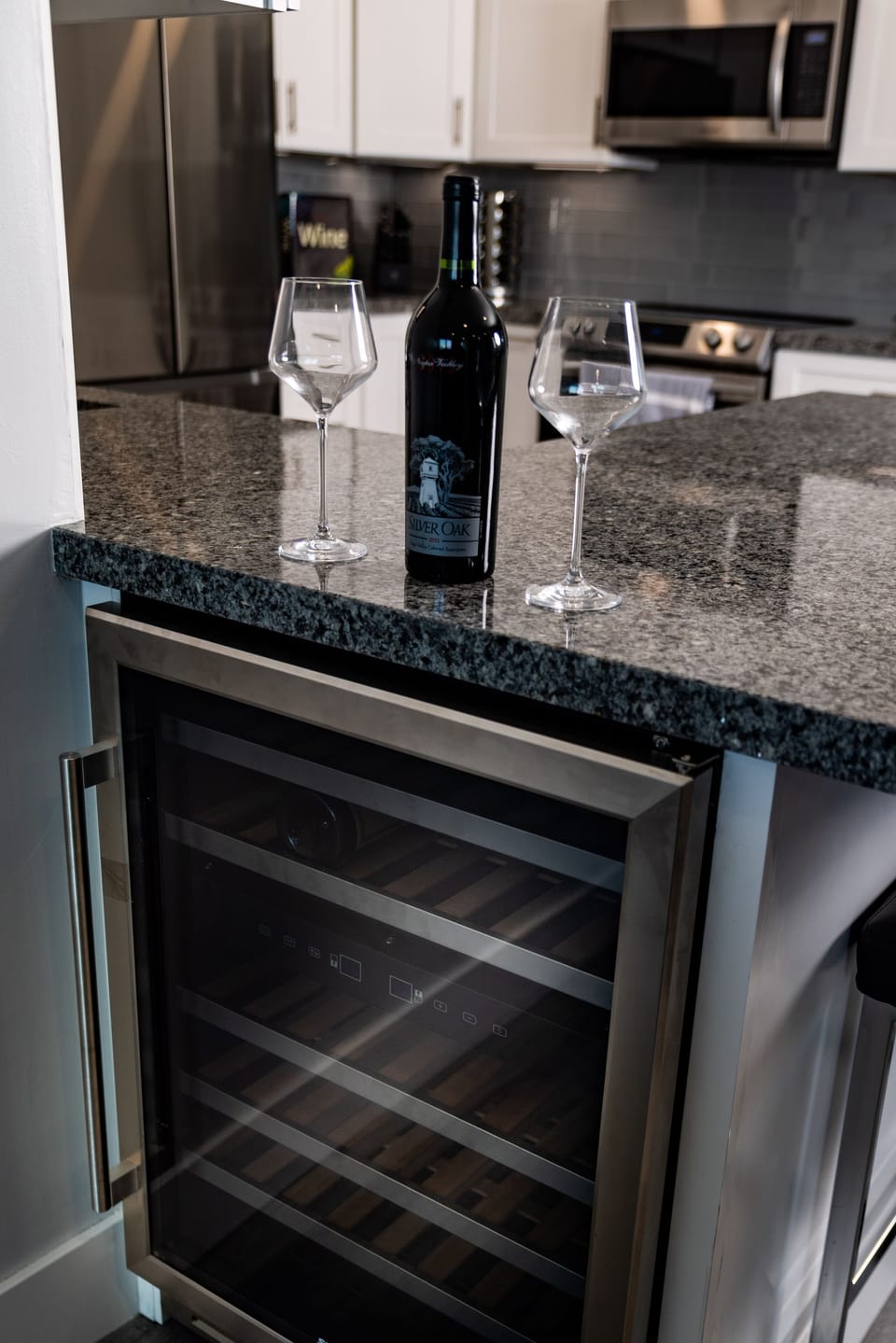 A dual-zone wine fridge keeps your favorite reds and whites perfectly chilled