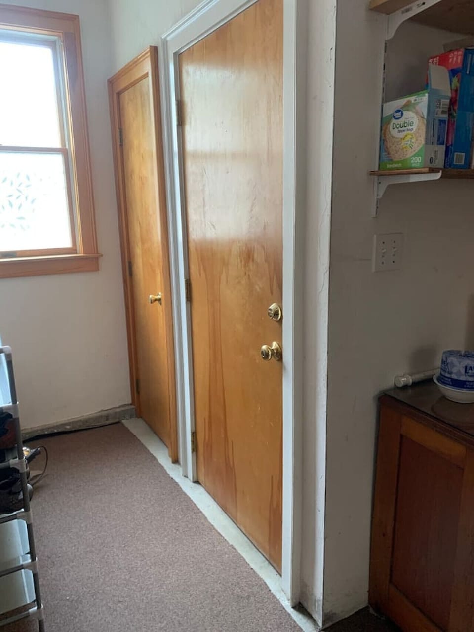 Interior door from the garage leading up the stairs to the Loft Hideaway