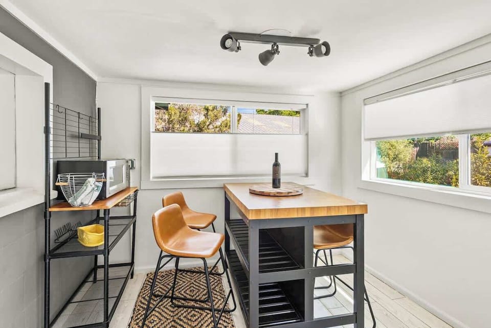 small kitchen nook to enjoy meals at- please note *ceiling height is very low in this room and the kitchen-people over 6 ft. tall will have to duck*