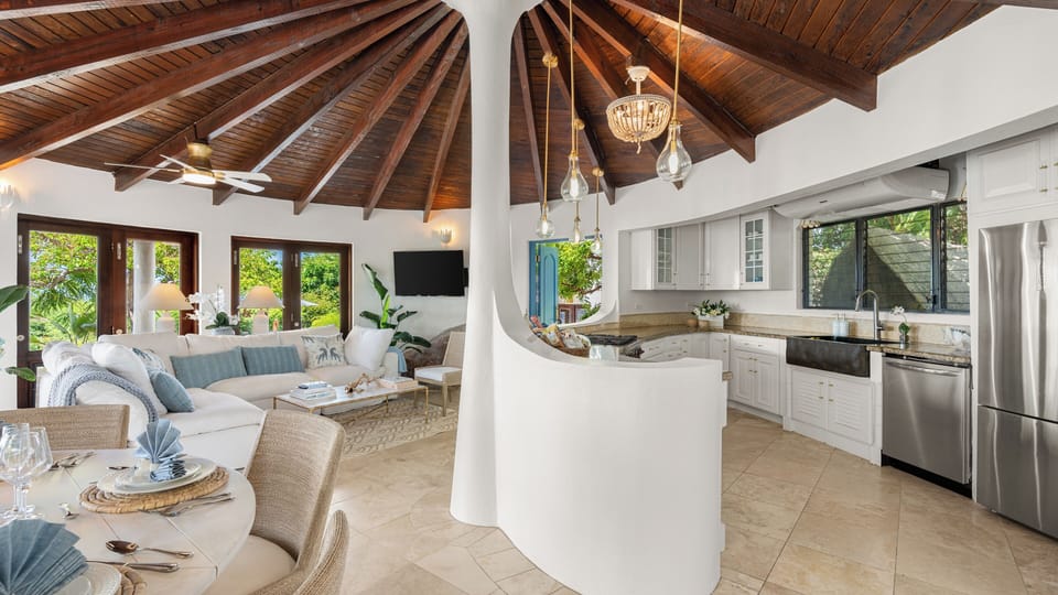 Great room features sea grass appointments and cloud couch for relaxing 